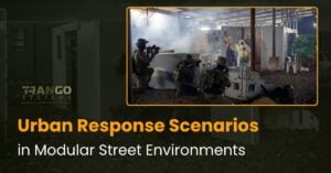 Tactical team training in a Trango modular street environment with barricades, building walls and human targets